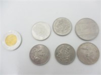 Lot des pièces 50 cents dont une en argent et 1$