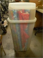 ROLLS OF WRAPPING PAPER IN A STORAGE CONTAINER