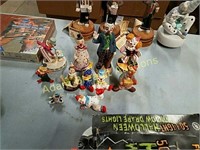 12 assorted clown figurines