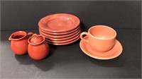 Lot of rust colored plates and more