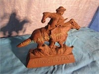 Cast iron horse & rider - says