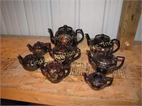 8 teapots (various sizes)