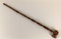 Wooden peace pipe with intricate carving