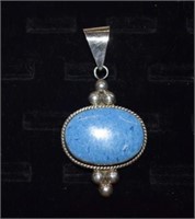 Sterling Silver Pendant with Blue Stone