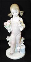 Lladro Figurine Of Girl With Bird And Flowers