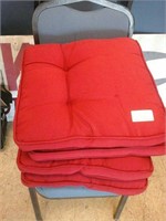 Set of 4 red fabric chair cushions