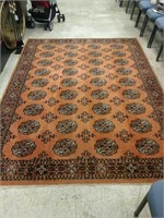 Large orange and brown area rug