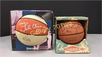 Pair of signed mini basketballs