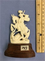 Ivory carving of Saint Michael slaying the dragon