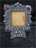 STERLING FRAME WITH INLAID STONES