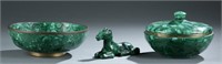 Group of three carved malachite objects.
