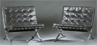 Pair of black leather Barcelona chairs