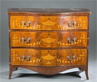 Chest of drawers w/ urn & bellflower inlay.