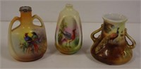 Three assorted miniature Royal Bayreuth bird vases