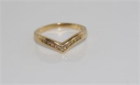9ct yellow gold ring with channel set diamonds