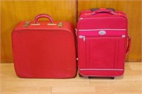 Two red travel bags