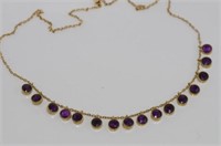 Good 14ct yellow gold and amethyst necklace