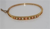 14ct gold pearl and coral bangle