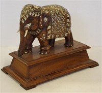 Carved timber and ornate inlay elephant figure