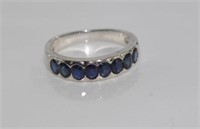 Silver and 8 blue sapphire ring