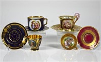 FOUR CONTINENTAL PORCELAIN CUPS AND SAUCERS