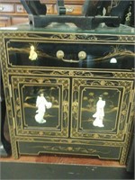 Small glass top oriental style end table