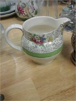 Ceramic pitcher and a Ceramarte ceramic cup