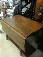 Wooden table with extenders
