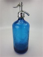 Teal Blue Selter bottle by National Spring Water