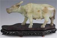 CHINESE CARVED SERPENTINE FIGURINE OF OX W BASE