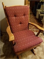 Wooden gliding chair, burgundy cushion