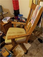 Wooden swivel armchair