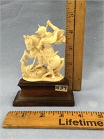 Ivory carving  4.5" tall, mounted on hardwood base