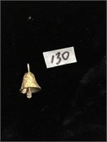 Gold nuggeted bell pendant with a small diamond, w