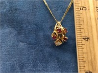 Ruby and diamond pendant on an 18K gold chain, wei