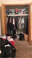 Entire contents of closet and bags of clothes