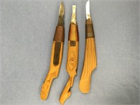 Set of wood handled Tlingit carving tools, carved