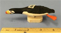 A 4.5" swimming horned puffin with a fish in it's