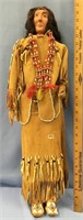 26" Indian doll with a carved wood body and a clay