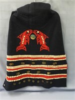 A whale clan dance cape with abalone buttons and o
