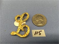 Gold nugget pin made into the letter "L" weight: 6
