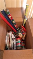 Box of Christmas wrap ribbons and boxes