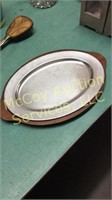 Metal serving tray with wooden base