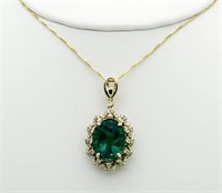 $18,975 14kt 6.01 ct Emerald & Diamond Pendant