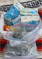 Basket of Drapery Hooks and Support Brackets
