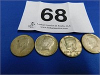 Four 1967 silver Kennedy halves (all P)