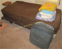 Twin bed w/ sheets, blankets & 2 seat cushions