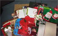 Large lot of Christmas gift bags and boxes