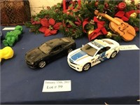 TWO 1:18 SCALE DIE CAST TOY MODELS OF LATE MODEL