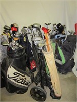 HUGE LOT OF GOLF CLUBS, BAGS, CADDY